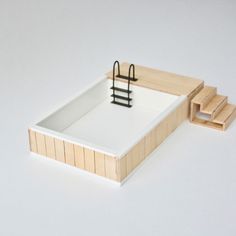 a miniature model of a desk and chair