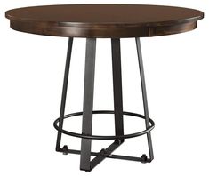 a round table with two metal barstools and a wooden top on an isolated white background