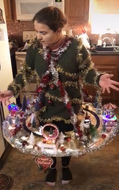 This Person Took Things To The Next Level And Attached A Whole Working Train Set And Christmas Village To Her Sweater Work Ugly Christmas Sweater Contest, Christmas Spirit Outfit, Ugliest Christmas Sweater, Making Ugly Christmas Sweaters, Best Christmas Sweaters