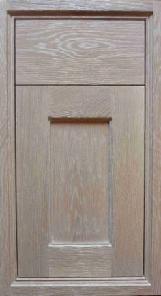 a close up of a wooden cabinet door