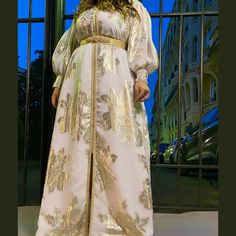 Elegant White Gown For Diwali, Elegant White Gown For Festivals, White Transitional Wedding Gown, Elegant Gown With Zari Work For Eid, Gold Gown For Eid, Elegant Wedding Dresses For Diwali, Elegant Gown For Festive Transitional Events, Gold Dabka Wedding Dress, Elegant Party Abaya With Dabka Detailing