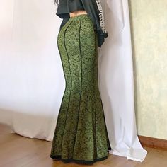 Experience the enchanting allure of our Medieval Gothic Green Maxi Skirt, a unique blend of gothic charm and fairy elegance. This skirt features a mesmerizing mermaid design, accentuated with intricate lace trim that adds a sophisticated touch. The vibrant green artwork infuses this luxurious garment with an extra layer of elegance, making it a standout piece in any wardrobe. Perfect for making a statement at any event, this exclusive skirt is an embodiment of style and mystique. Mesmerizing mer Skirts Aesthetic, Mermaid Skirts, Fitted Maxi Skirt, Fairycore Grunge, Green Maxi Skirt, Steampunk Skirt, Mode Retro, Mode Grunge, Estilo Hippie