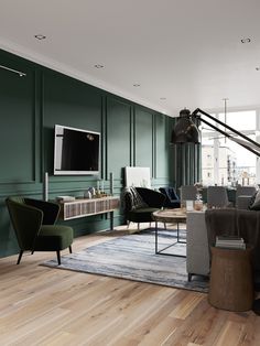 a living room filled with furniture and green walls