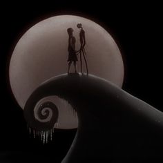 two people standing on top of a wave in front of a full moon with icicles