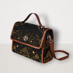 "Crescent Moon Roses Flowers Cross Body Purse, Witch Canvas Satchel bag, Cute womens Shoulder Bag hand bag boho gift Cottagecore mushroom bag >>PRODUCT INFO<< Type: Waterproof Canvas, 10.63\"(L) x 4.13\"(W) x 7.87\"(H), Brown PU Strap * 18.94 Oz. Made from high-grade waterproof canvas, durable, water-resistant. * Can be used as a nice laptop storage bag, business briefcase, college school bag, leisure travel tote bag, crossbody messenger bag, card wallet case, etc. * Two interior pockets for sma Rectangular Satchel With Adjustable Handle As Gift, Gift Satchel With Adjustable Handle And Tote Shape, Bohemian Handheld Shoulder Bag For Gift, Bohemian Handheld Shoulder Bag As Gift, Handheld Shoulder Bag With Adjustable Handle As Gift, Mushroom Bag, Cottagecore Mushroom, School Bag College, Canvas Satchel