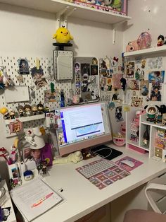 a desktop computer sitting on top of a white desk