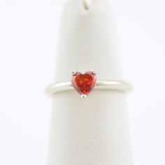 "Minimalist Sterling Silver Ring, Reddish Orange Topaz Color Gemstone, Heart Shaped. Dainty, Stack. Gift for Mom, Girlfriend, Sister, Friend, You! SOLID STERLING SILVER. November Birthstone. The unique jewelry you can find, a perfect gift for you and your loved one. Tell \"you are my heart!\" It's dainty but sturdy and can be worn every day. A special piece you'll truly treasure! High polished finish. The price is for ONE ring. This dainty, elegant, but sturdy ring comes in a gift box and SHIPS Heart-shaped Sterling Silver Ruby Birthstone Ring, Heart-shaped Solitaire Birthstone Ring Gift, Red Sterling Silver Heart Ring With Birthstone, Red Heart Cut Sterling Silver Birthstone Ring, Heart Shaped Ring, Orange Gem, November Birthstone Ring, Topaz Color, Reddish Orange