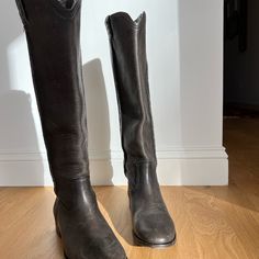 These Are Such A Great Boot. Stylish And Cool, Versatile. Looks Great With Both More Casual Looks And Dressier Styles. Gorgeous Distressed Leather With Exposed Seam Detailing Running Down Side. Measurements Are Approximate To Give You A Close Idea Of Sizing. Distressed Leather. Never Been Worn! Classic Gray Leather Boots, Western Gray Leather Boots, Leather Tall Boots, Tall Leather Boots, Dressy Fashion, Frye Shoes, Distressed Leather, Tall Boots, Brown And Grey