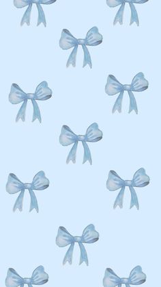 several blue bows on a light blue background