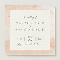 the wedding announcement card is shown in pink and white with gold foiling on it