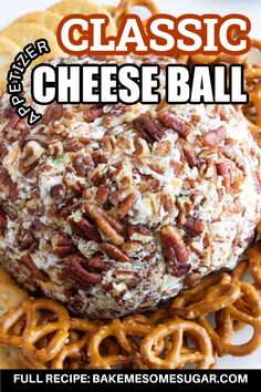 a cheese ball with pretzels and nuts on top is featured in this recipe