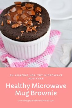 a close up of a cupcake on a plate with the title text overlay reads an amazing healthy microwave mug cake