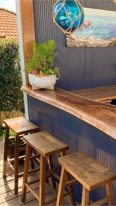 two stools are sitting at the bar