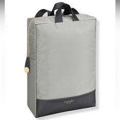 a large gray bag with black handles