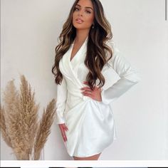 Bloggers Favorite. New Elegant White Long Sleeve Wrap Dress, Elegant White Wrap Dress For Party, White Fitted Wrap Dress For Party, Elegant White Mini Dress With Surplice Neckline, White Mini Dress With Surplice Neckline For Party, White Surplice Neckline Mini Dress For Party, White Fitted Wrap Dress For Evening, Elegant White Surplice Neckline Dress, White Surplice Neckline Evening Dresses