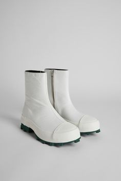 Vulcanized white leather zip boots with green toothed rubber outsoles. White Boots For Women, Green Teeth, Blue Leather Boots, White Ankle Boots, Comfy Boot, Camper Shoes, Ankle Boots Men, Fall Winter Collection, Shoes Heels Wedges