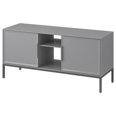 a gray entertainment center with two shelves and one door open to show the same item