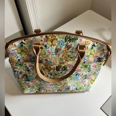 Medium Sized Tote Style Purse With Plenty Of Pockets And Space. It Has A Multi Colored Floral Pattern With Gold Embellishment As Shown In Pictures. Great Condition New Without Tags Smoke And Pet Free Bundle And Save Please Feel Free To Make An Offer! Gold Embellishment, Womens Tote Bags, Green Yellow, Multi Colored, Medium Size, Floral Pattern, Purse, Pet, Handbags