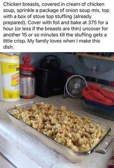 a pan filled with food sitting on top of a counter