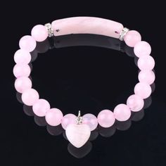 Rose Quartz Bracelet, Alloy Charm Bracelet,Love Bracelet, Women Jewelry, unconditional love bracelet.  Rose Quartz is the love stone! Adds positive love energy to relationships. Compassion and forgiveness. Calming, helps clear stored anger, resentment, jealousy, fears. Replaces negativity with harmony. Helps to balance upper four chakras and eases sexual/emotional imbalances. Enhances self-confidence and creativity. Aids kidneys and circulatory system, promotes release of impurities. The rose quartz crystal can be worn as a bracelet or place a stone under your pillow at night.  Due to the nature of stone formations and our studio lighting, every gemstone product will vary slightly, in shape, size, color, pattern and will not be an exact replica of the one you see in photos. Merchandise enl Pink Bracelets With 8mm Beads For Mother's Day, Pink Bracelet With 8mm Beads For Mother's Day, Pink Spiritual Bracelet For Mother's Day, Pink Heart-shaped Spiritual Beaded Bracelets, Rose Quartz Round Beads Bracelet For Valentine's Day, Pink 8mm Bead Jewelry For Valentine's Day, Pink Adjustable Rosary Bracelet For Healing, Pink Rose Quartz Bracelets For Valentine's Day, Adjustable Pink Rosary Bracelet For Healing