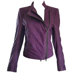 Stylish 1990s ANN DEMEULEMEESTER purple/eggplant leather motorcycle jacket! Features a luxurious soft leather. Full black metal double zippers down the front. Zippered pocket a right waist. Fantastic tailored fit looks amazing on! The perfect alternative to a black leather jacket. Fully lined. Great with jeans, trousers, a skirt, or over a dress. In great unworn condition. Made in Italy Marked Size EU 38 Measurements: 36-38 inch bust 30-32 inch waist 22 inches from top back center collar to hem Vintage Motorcycle Jacket, Purple Motorcycle, Vintage Biker Jacket, Egyptian Clothing, Purple Leather Jacket, Purple Eggplant, 90s Fits, Moto Vintage, Vintage Jean Jacket