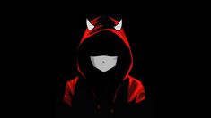 a person wearing a red hoodie with horns on their head and eyes, in the dark