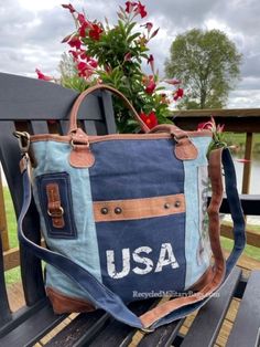 USA Blue Tote Bag crafted of repurposed and upcycled military canvas into this exceptional carry tote with a detachable crossbody strap! Upcycled Canvas Shoulder Bag For Daily Use, Everyday Upcycled Tote Canvas Bag, Upcycled Tote Shoulder Bag For Everyday, Upcycled Everyday Tote Shoulder Bag, Everyday Upcycled Canvas Tote Bag, Everyday Upcycled Tote Shoulder Bag, Upcycled Blue Tote Bag, Blue Upcycled Tote Bag, Blue Upcycled Canvas Bags