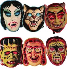 four masks with different faces on them and one is painted red, the other has blue eyes