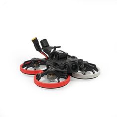 an image of a black and red remote control vehicle on white background with clipping for text