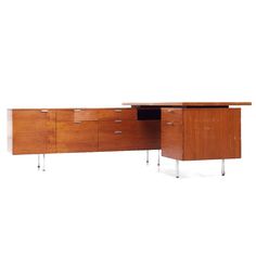 an office desk with two drawers on each side