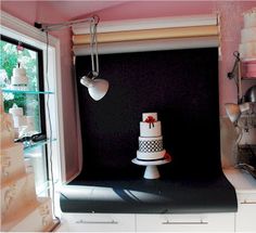 a wedding cake sits on top of a counter