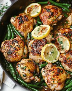 chicken, green beans and lemons in a skillet