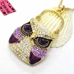 Betsey Johnson Owl Purse Purple Rhinestones Crystal Eyes Gold NecklaceItem: Necklace Vendor: Betsey Johnson Necklace Chain Length: 27.5 Inches Pendant Dimensions: 2.56" x 1.61" (Inches) Color: Purple, Gold Metal: Alloy, Lead & Nickle FreeMaterial: Crystal Rhinestones Theme: Owl, Purse, HandbagMeasurements are approximate. Sold as One Individual Necklace. Fun pendants, flirty necklaces, bright brooches, and chunky bracelets do more than just add a touch of sparkle – they represent who you are. Be Owl Purse, Purse Purple, Crystal Eyes, Betsey Johnson Necklace, Crystal Eye, Chunky Bracelets, Necklace Chain Lengths, Purple Rhinestone, Betsey Johnson Jewelry