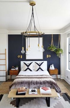 a bed room with a neatly made bed next to a window and a rug on the floor