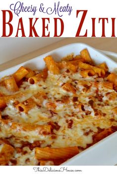 cheesy and meaty baked ziti in a white casserole dish