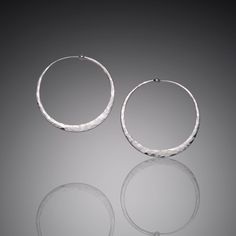 "DETAILS: Materials: solid sterling silver Size: Large - 1.75\" outside diameter Width: 3/16\" at the widest point Weight: 4.2 grams each (a US Penny weighs 2.5 grams) All measurements are approximate. Each pair is made by hand, resulting in variation. Need help choosing your hoop size? Visit my blog for a printable chart of hoop sizes in actual scale! www.mostlysweet.com/hoopsize SHIPPING: All domestic orders ship free using USPS First Class. Expedited shipping upgrades are available during che Us Penny, Large Silver Hoop Earrings, Sweet Jewelry, Statement Hoop Earrings, Printable Chart, Hammered Sterling Silver, Hammered Silver, Everyday Earrings, Sterling Silver Hoops