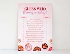 a pink card with donuts on it that says guess who mommy is daddy?