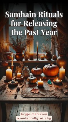 candles and pumpkins on a table with the words samhan rituals for releasing the past year