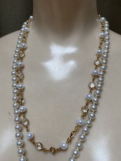 "Instant faux pearl collection to wear together or to 'rearrange' with your own gold hoops or pearl studs. Faux pearls are not bright white but a classic candlelit white, so popular in classic pearl strands. No names on these items but they speak for themselves. The longest pearl strand measures 28\" with a goldtone etched slide insert clasp. Long enough to put over your head without even using the clasp. Knotted between each bead so the strand lays smoothly without any stiffness. Also, the pear Pearl Pendant Costume Jewelry, Costume Jewelry Pearl Pendant, White Pearl Button Jewelry For Party, White Jewelry With Pearl Buttons For Parties, Costume Jewelry With Pearl Drop, Pearl Drop Costume Jewelry, Formal Costume Pearl Necklace, White Pearl Costume Jewelry, Costume Jewelry Pearl Necklace With Pearl Pendant