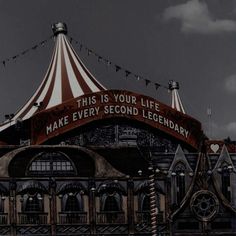 a large circus tent with an advertisement on it