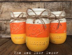 three mason jars with the words rad bacon painted on them