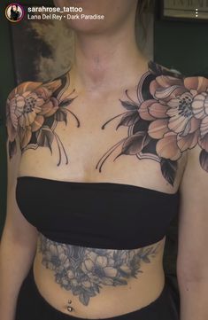 an image of a woman with flowers on her chest and arm tattoo design in progress