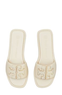 A sleek leather slide accented by Tory's signature double-T logo is ready to upgrade your warm-weather style. Leather upper and lining/rubber sole Imported Shoe Ideas For Women, Tory Burch Slides, Spring Shoes Women, Shoes For School, Pretty Sandals, Pretty Shoes Sneakers, Shoe Ideas, Shoes Sneakers Jordans, Tory Burch Sandals