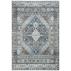 a blue and beige rug with an ornate design on the bottom, in front of a white background