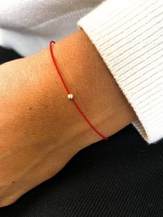 14k Gold Red silk string bracelet, solid gold red silk string Bracelet, Red string minimalistic wish bracelet, friendship bracelet, by TherapyAccessories on Etsy Metal Friendship Bracelets, Minimalist 14k Gold Red Bracelets, Red 14k Gold Dainty Bracelet, Minimalist Red 14k Gold Bracelets, Minimalist Red 14k Gold Bracelet, Red Minimalist Bracelet For Everyday Wear, Red Minimalist Bracelet For Everyday, Minimalist Red Bracelets For Everyday, Minimalist Red Everyday Bracelet