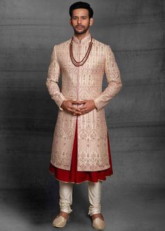 Latest Men Peach Wedding Sherwani
Designer custom made Peach embroidered sherwani with chudidar . The latest heavy silk embroidered sherwani is best choice for reception wear . It is suited for Indian and Pakistani wedding wear . 
One of the standout features of this sherwani is the intricate embroidery adorning its surface. Our skilled artisans have meticulously handcrafted every detail, using fine threads and intricate patterns that showcase traditional Indian craftsmanship at its best. The embroidery showcases a harmonious blend of motifs, ranging from floral designs to intricate geometric patterns, creating a visually stunning ensemble that captures attention and admiration . Please note there can be slightly difference between the image and the product due to screen resolution and c Silk Anarkali, Indo Western Dress, Anarkali Kurta