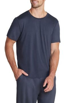 Lightweight and exceptionally soft, this stretchy T-shirt makes a great choice for the gym, a relaxing afternoon or a night of sweet, sweet slumber. Crewneck Short sleeves 91% polyester, 9% spandex Machine wash, tumble dry Imported Summer Lounging T-shirt With Short Sleeves, Soft Stretch Tops For Loungewear, Soft Touch Stretch Tops For Relaxation, Relaxed Short Sleeve T-shirt For Relaxation, Cotton Crew Neck T-shirt For Lounging, Short Sleeve Athleisure Tops For Relaxation, Comfortable Short Sleeve Tops, Relaxed Short Sleeve Tops For Relaxation, Casual Short Sleeve Relaxed Top