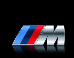 the bmw m logo is shown on a black background with reflective letters in silver, red and blue