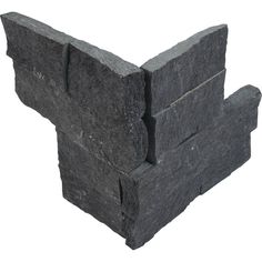 two pieces of cement sitting on top of each other