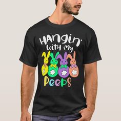 a man wearing a black t - shirt that says hangin with my pees